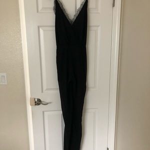 Black lace jumpsuit with low and bare back